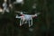 6 - Common white camera drone used for surveillance  plain background