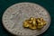 6 Gram Australian Gold Nugget on United States Silver Dollar