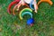 6 month old baby using to play a wooden rainbow puzzle, improving his skills, view from above