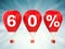 60% sale sign on red hot air balloons