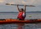64 year-old Korean female enjoying a kayaking adventure in the Atlantic Ocean at Bar Harbor, Maine.