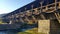 A 66-meter covered wooden bridge on the border between Italy and Austria