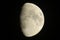 66% Waxing Gibbous Moon in a dark sky