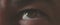 6k H.265 video of an macro close up of human green eye.