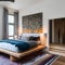 7 A bohemian-inspired bedroom with a mix of patterned and textured finishes, a low platform bed, and a mix of patterned and soli