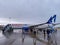 7 May 2022 Mardin Turkey. Anadolujet plane unloading passengers on apron on a rainy day