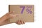 7 percent discount on isolate. Notepad from recycled paper in the hands of a child with text, sale up to 7 percent. The