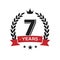 7 th birthday vintage logo template. Seventh years anniversary retro isolated vector emblem with red ribbon and laurel wreath on