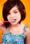 7 year old girl brushing teeth