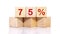 75 Percent text on wooden cubes on a white background