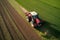 7Aerial_top_view_of_red_tractor_mowing
