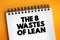 The 8 Wastes of Lean text concept on notepad for presentations and reports