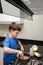 8 year old in the kitchen making a Brazilian sweet, brigadeiro brigadier