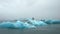 8K 7680x4320. Blue iceberg in foggy glacier lagoon, pure Icelandic nature. Beautiful natural miracle in north country of