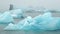 8K 7680x4320. Blue iceberg in foggy glacier lagoon, pure Icelandic nature. Beautiful natural miracle in north country of