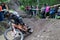 On 9/2/2017 in Copper Harbor, Michigan mountain biker cornering fast in the berm during enduro race