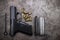 9 mm. Semi automatic pistol handgun and ammunition magazine on old cement texture background , Germany gun