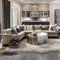9 A transitional-style living room with a mix of neutral and metallic finishes, a large sectional sofa, and a mix of patterned a