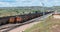 9111 and 9086 lashup and 6271 and 5660 lashup diesel locomotives head eastbound loaded coal trains