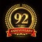 92nd golden anniversary logo, with shiny ring and red ribbon, laurel wreath isolated on black background, vector design