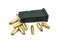 9mm bullets and magazine on white background