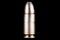 9mm caliber round on black