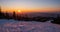 A00q%Sunrise in the mountains with trees and tracks from skis in the snow