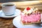 Aachen, Germany - Colorful Strawberry Cake and a Cup of Coffee