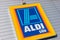 AACHEN, GERMANY FEBRUARY, 2017: Aldi sign south division against blue sky. Aldi is a leading global discount supermarket chain