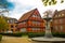 Aalborg, Denmark: Colorful townhouse with an old fountain in the foreground, Aalborg