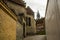 Aalborg, Denmark: Cozy narrow street view in the danish town of Aalborg with church in the background