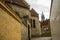 Aalborg, Denmark: Cozy narrow street view in the danish town of Aalborg with church in the background