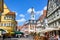 Aalen, Baden-Wuerttemberg, Germany. Old Town Hall with tower, streets, restaurants and statue on marketplace fountain