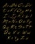 Aalphabet set of gold glittering sparklers strokes