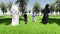 Aarab parents Saudi on green lawn landscape