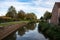 Aarschot, Flemish Brabant, Belgium, Historical brick stone houses reflecting in the River Demer