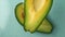 Aavacado presents striking juxtaposition: one half buoyantly floats, while the other remains hidden beneath the surface