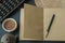 Abacus, notebook and Chinese tea set on the table