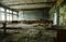 Abadoned school class room at Chernobyl city zone of radioactivity ghost town.