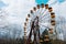 Abadonrd ferris wheel in Pripyat ghost town in Chernobyl exclusion zone, Ukraine