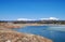 Abajo Mountains and winter lake in Utah