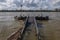 Abandon broken damaged rusty steel bridge toward pier, pontoon or buoy over Rhine River.