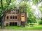 Abandon schoolhouse made of brick with peep holes to look in