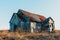 Abandoned 19th century house in a rural field at summer.Creepy summer evening.Toned