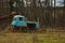 Abandoned agricultural machinery in an abandoned field camp.