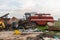 Abandoned agricultural machinery in a scrap yard