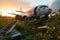 Abandoned airplane in the field at sunset. Generative AI