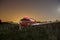 Abandoned airplane at night