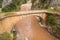 Abandoned arch bridge at Dipotama area in Evrytania leading from Karpenisi town to Proussos monastery