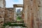 Abandoned arch providing entry to a crumbling masonry ruin in Hierapolis, Pamukkale